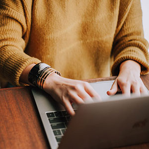 Person on laptop participating in an online study